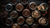 Freshly roasted Coast Roast Organic Coffee beans in glass jars